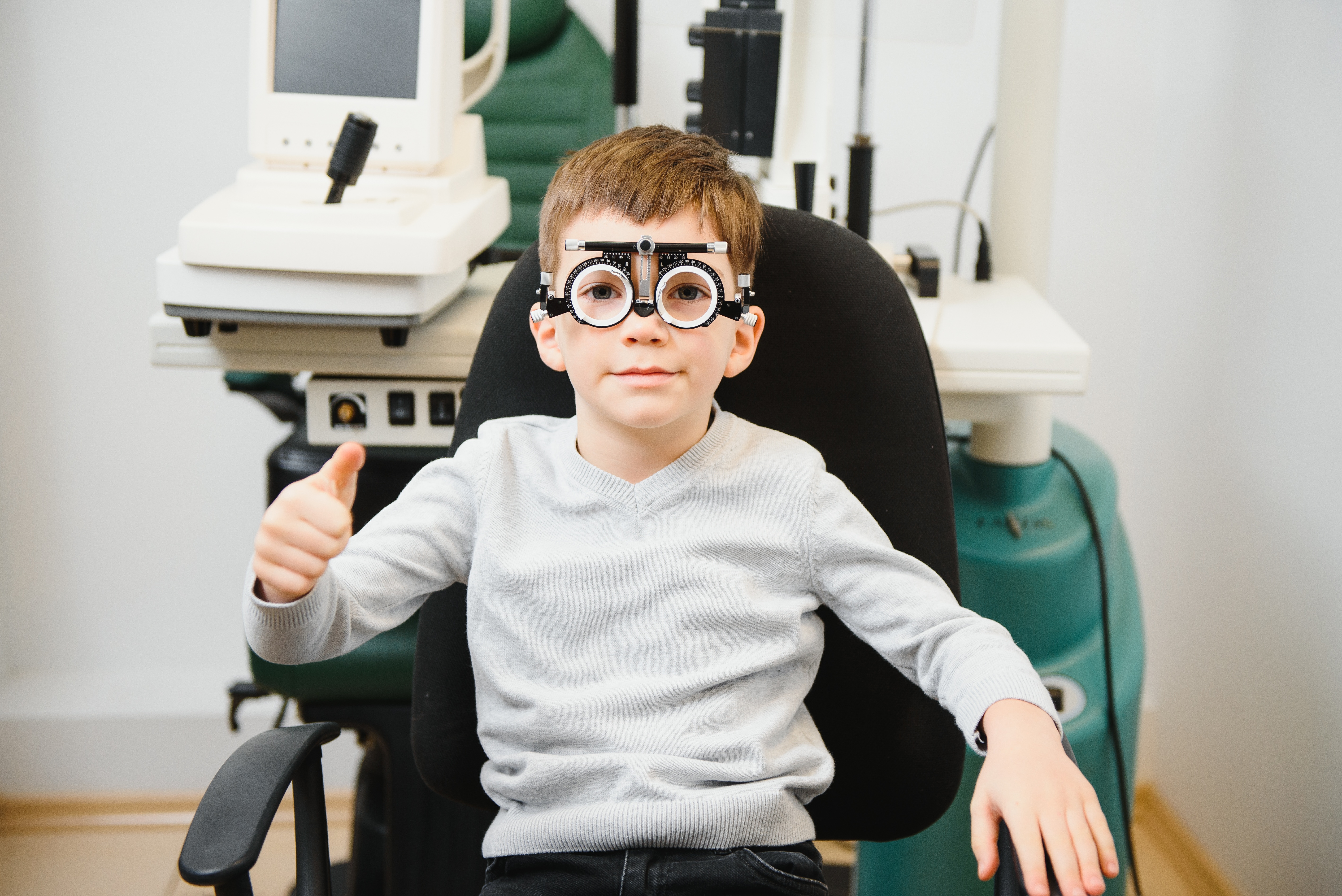 Small Serious Boy Sitting On Chair Office Of Visio 2023 10 18 05 29 52 Utc